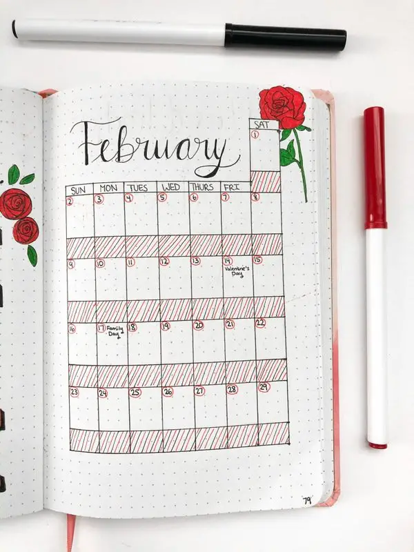 February bullet journal calendar with red roses