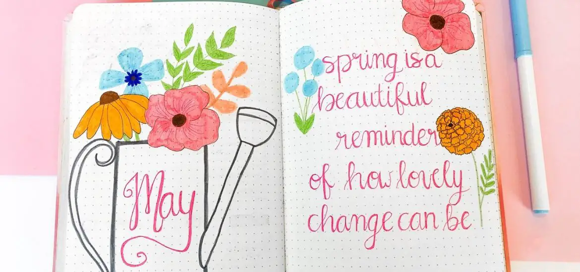 May bullet journal cover page and quote page with wildflowers