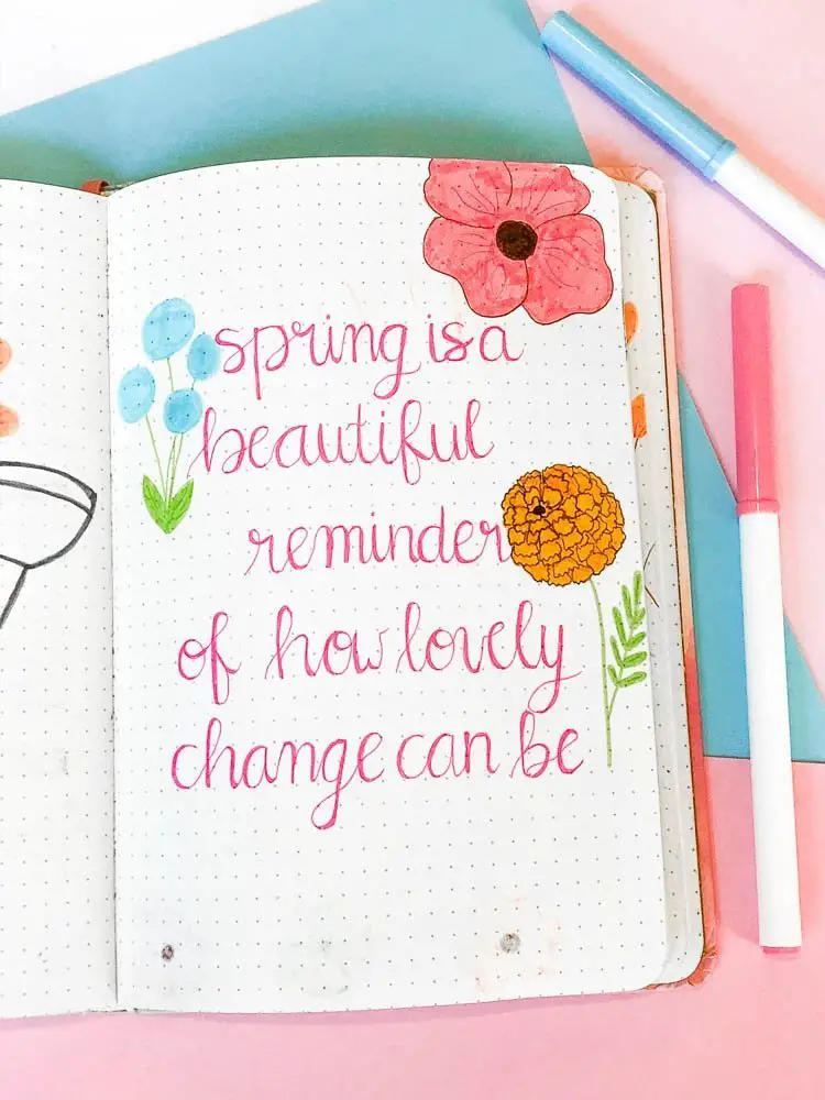 Bullet Journal spring quote page with wildflowers