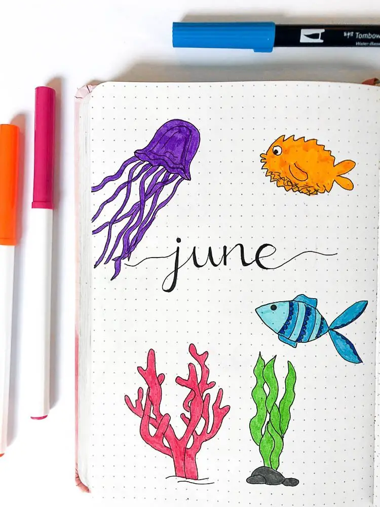 June bullet journal cover page with an ocean theme