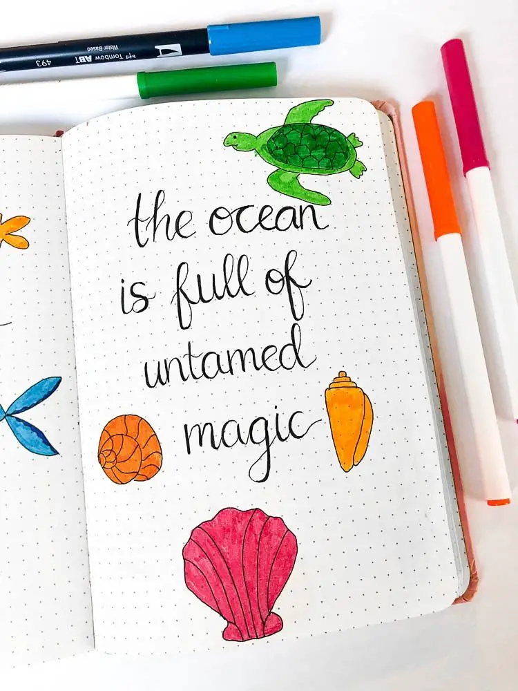 Bullet journal quote page with an ocean theme