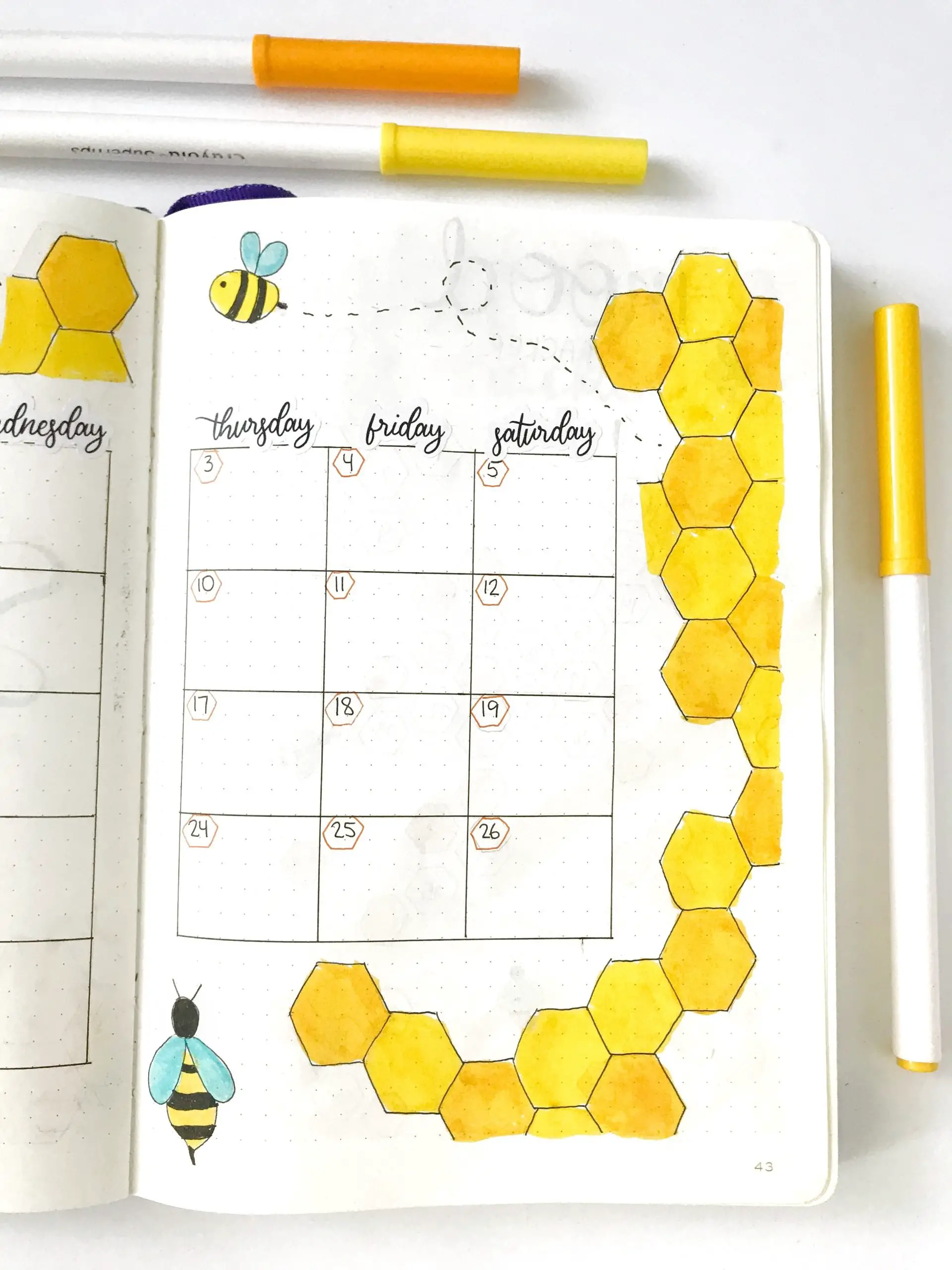 September bullet journal monthly calendar with honeybee theme
