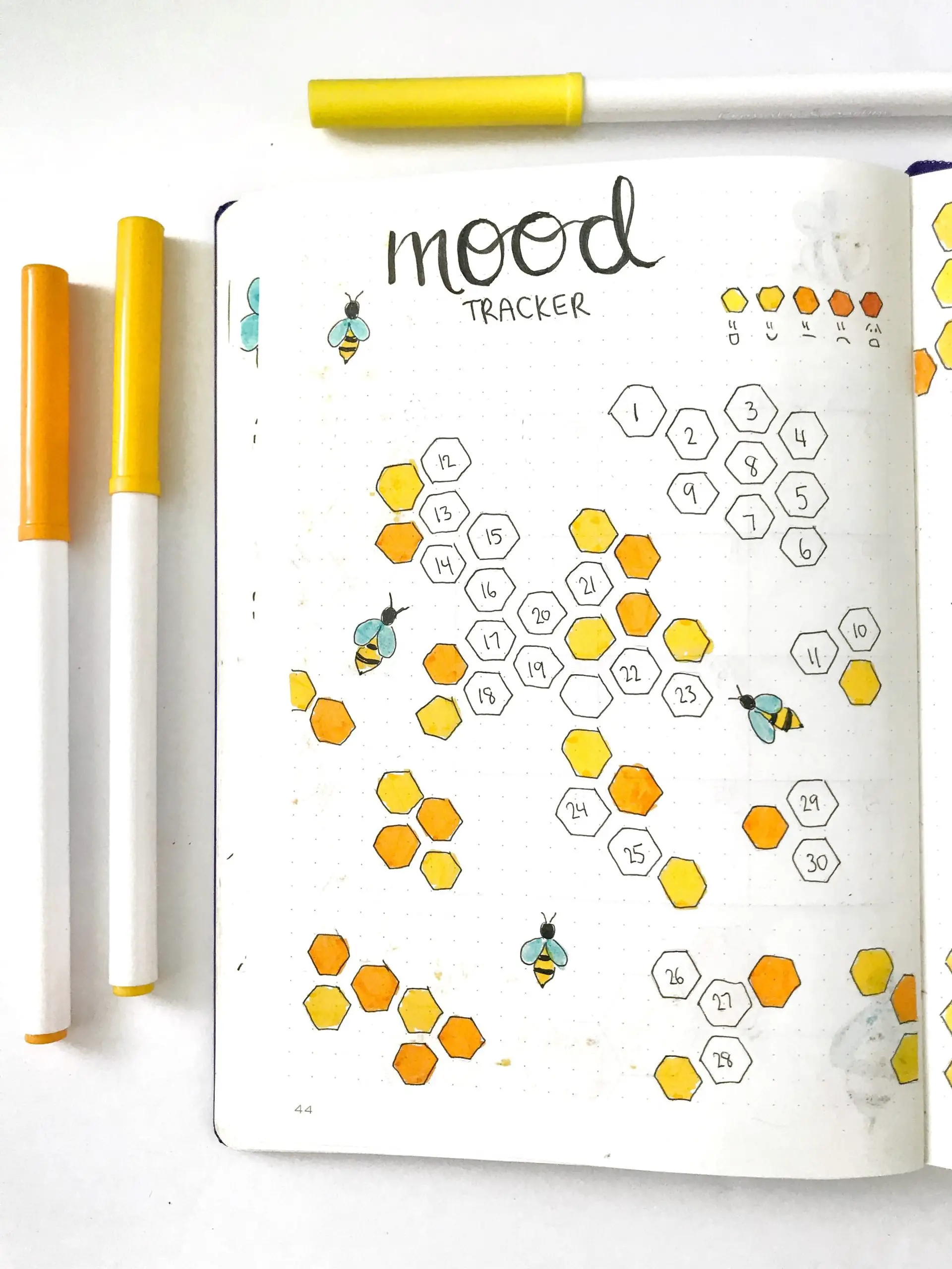 bullet journal monthly mood tracker with honeycomb theme