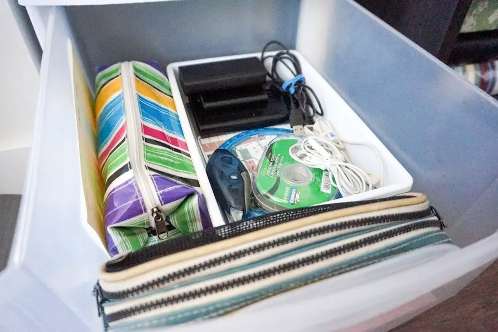 stationery and office supplies inside plastic organizers