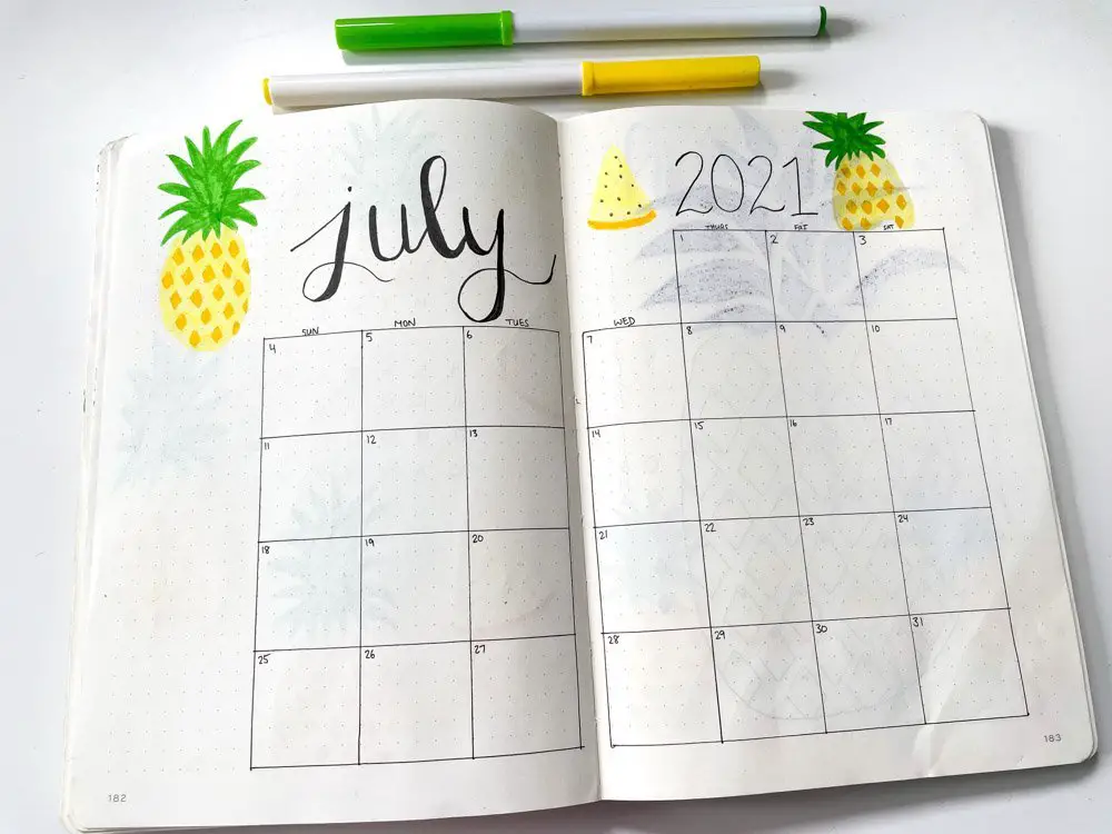 july bullet journal calendar with pineapples